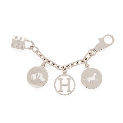 hermes breloque olga bag charm|Hermès Palladium Olga Breloques Bag Charm Available For .